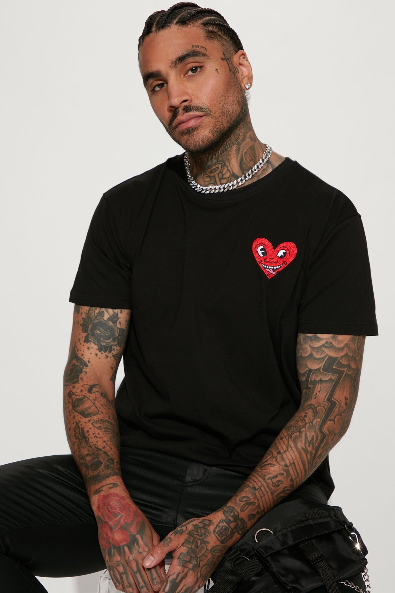 Keith Haring Heart Logo Short Sleeve Tee - Black sold by Fashion Nova