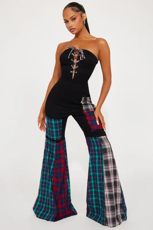 Ava Patchwork Jumpsuit - Black sold by Fashion Nova