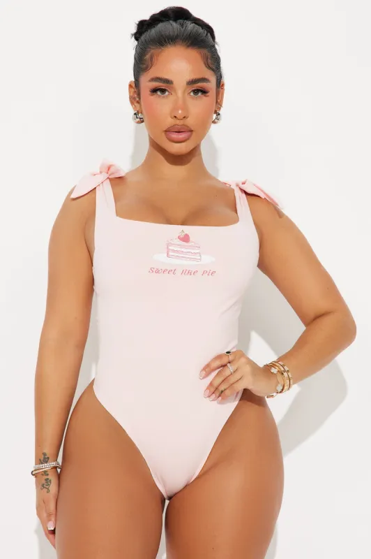 The Sweetest Cherry Pie Bodysuit - Pink sold by Fashion Nova