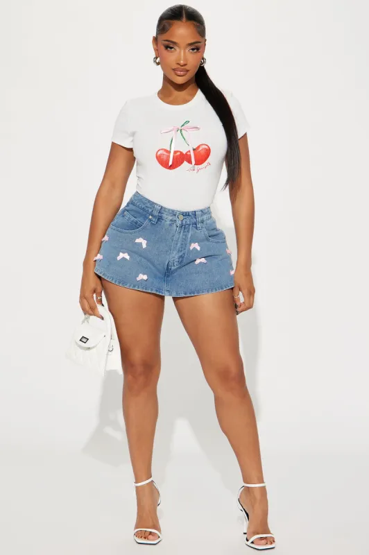 Feeling Pretty Bow Denim Skort - Medium Wash sold by Fashion Nova