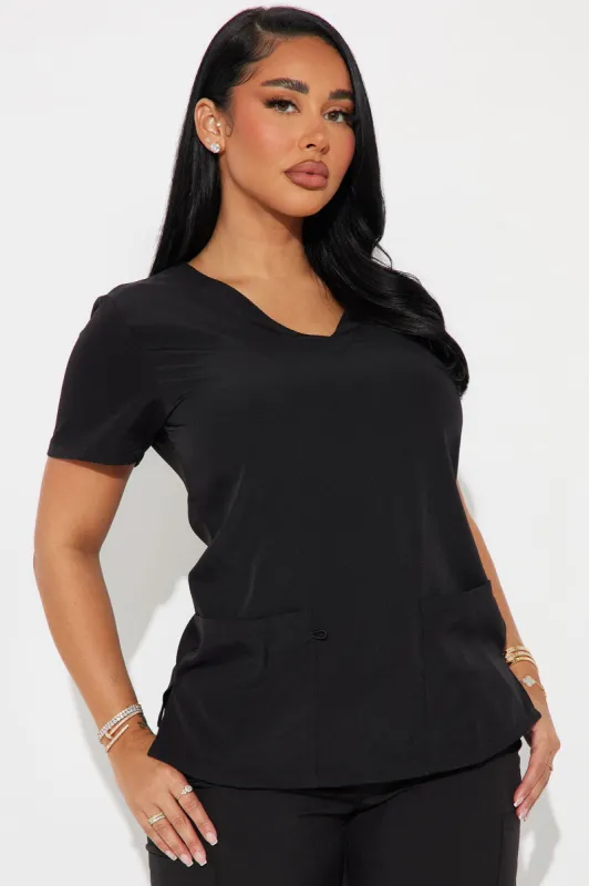Working Overtime 4FLEX Uniform Scrub Top - Black sold by Fashion Nova
