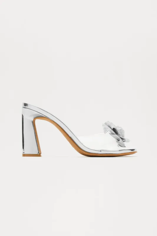 Fallyn Rhinestone Flower Mules - Silver sold by Fashion Nova