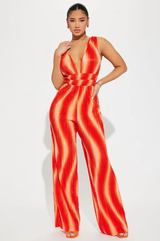 Sunset Cruise Plisse Jumpsuit - Orange/combo sold by Fashion Nova