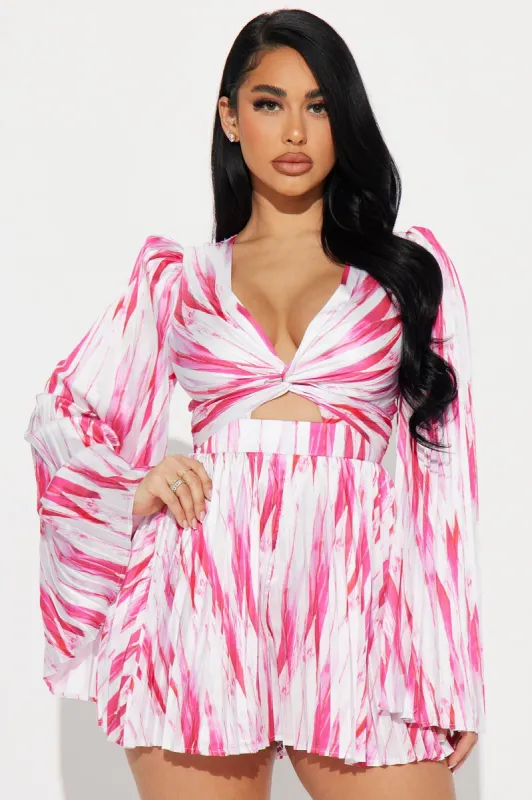 Turning Heads Romper - Pink/combo sold by Fashion Nova