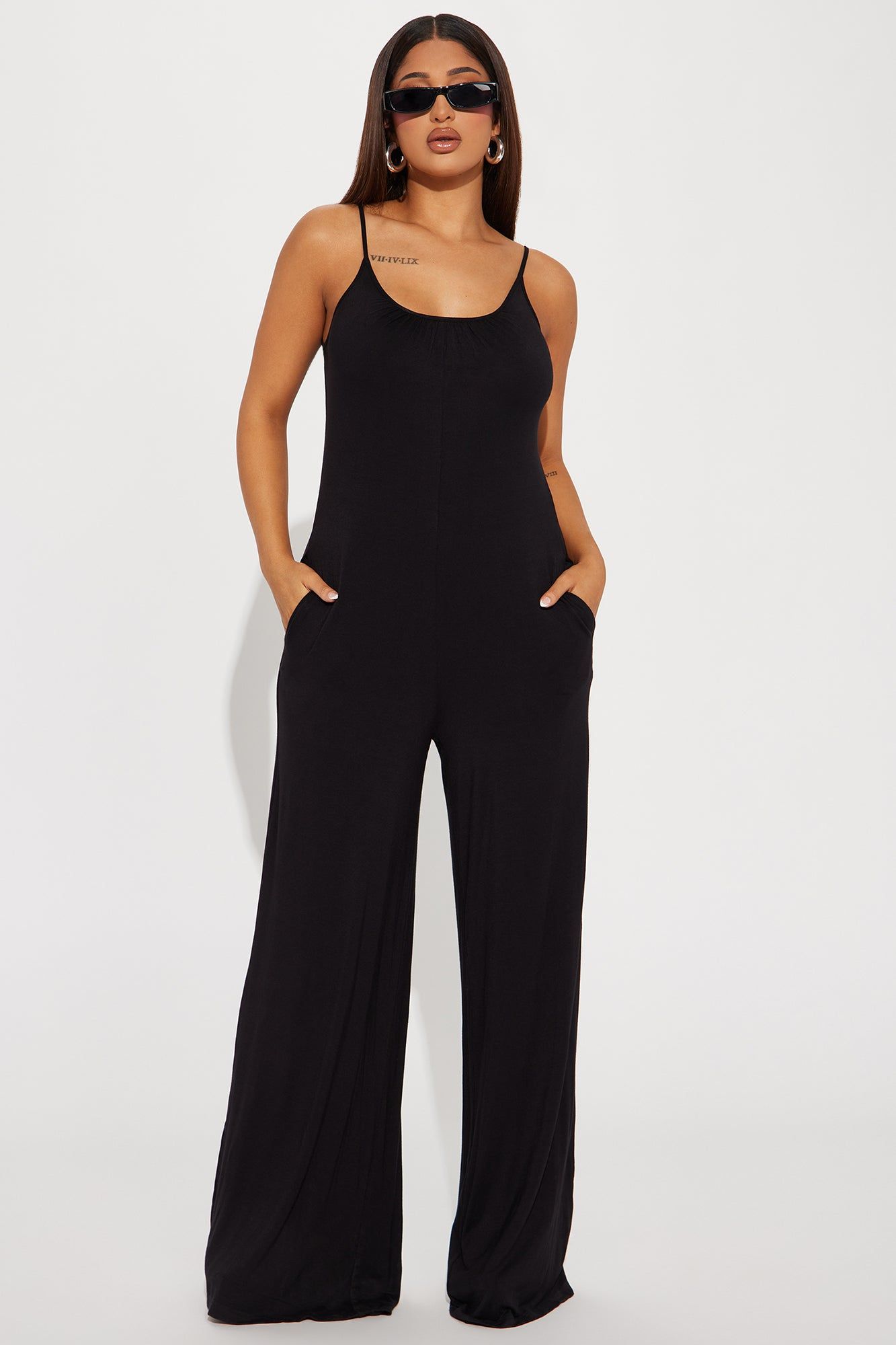 Dare To Dream Jumpsuit - Black sold by Fashion Nova