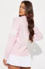 Emma Varsity Cardigan - Pink sold by Fashion Nova