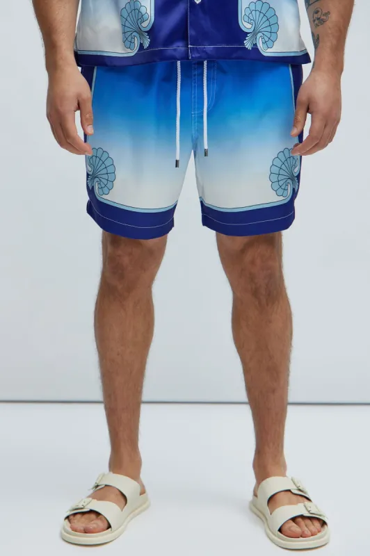 Seadrift Swim Trunks - Blue/combo sold by Fashion Nova
