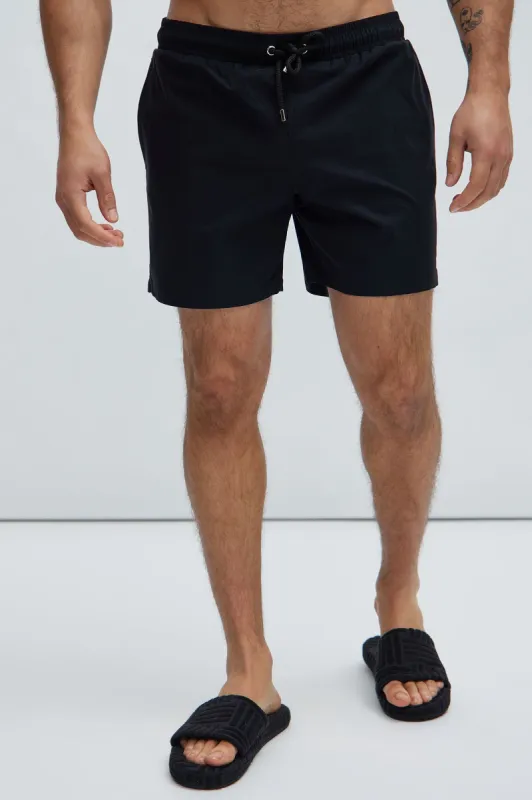 Montez Stretch Swim Trunk Mid - Black sold by Fashion Nova