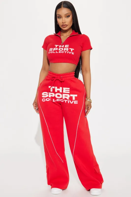 The Sport Collective Wide Leg Pant - Red sold by Fashion Nova