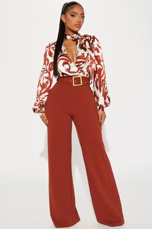 Extra Passion Jumpsuit - Rust/combo sold by Fashion Nova