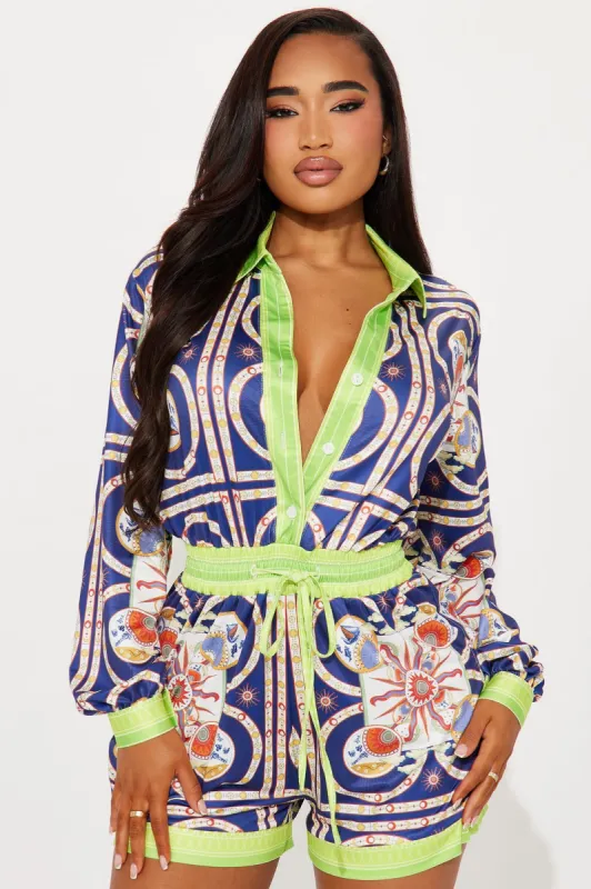Sevilla Printed Romper - Navy/combo sold by Fashion Nova