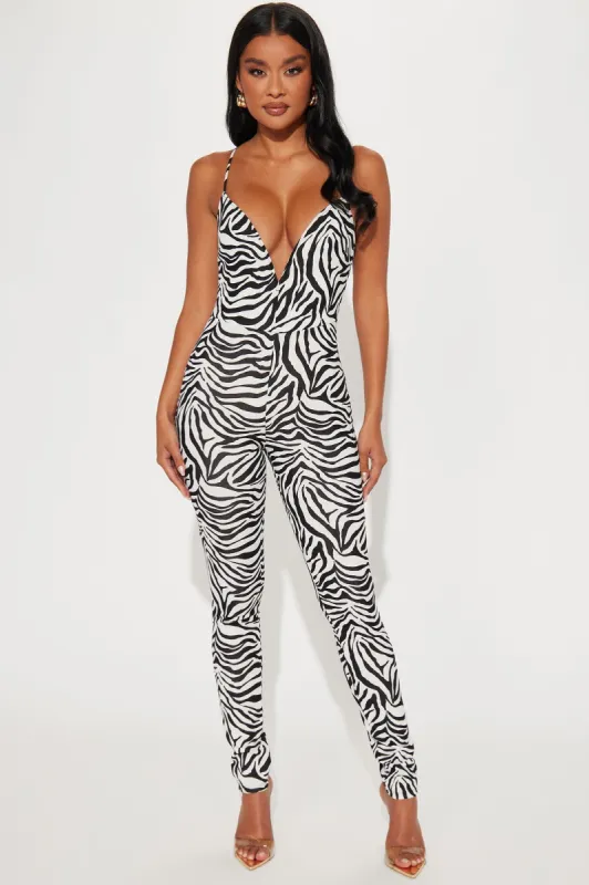 Wild Child Jumpsuit - White/Black sold by Fashion Nova