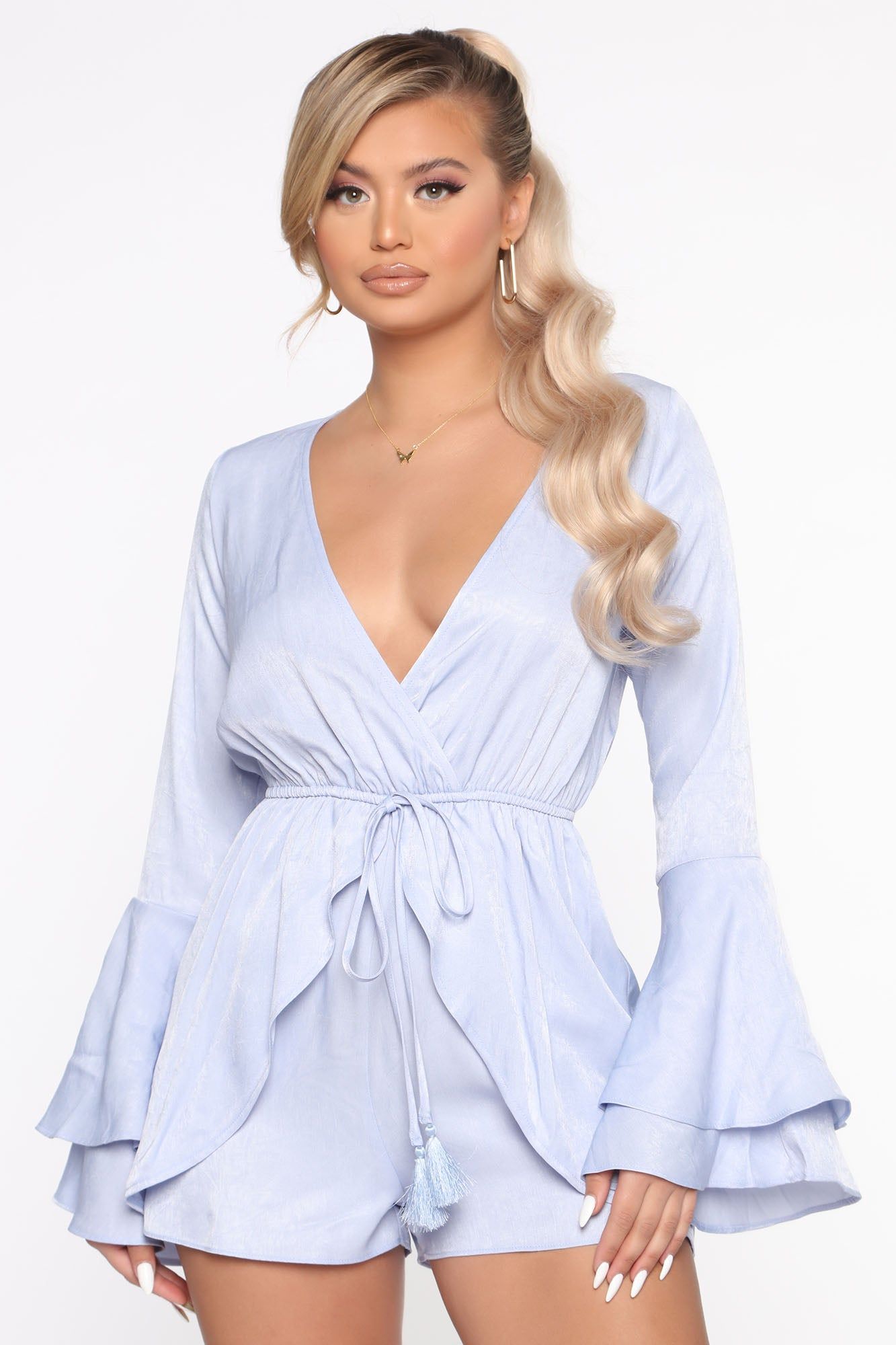 Julia Surplice Romper - Blue sold by Fashion Nova