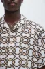 Interlocked Shirt - Off White/combo sold by Fashion Nova