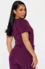 Working Overtime 4FLEX Uniform Scrub Top - Wine sold by Fashion Nova