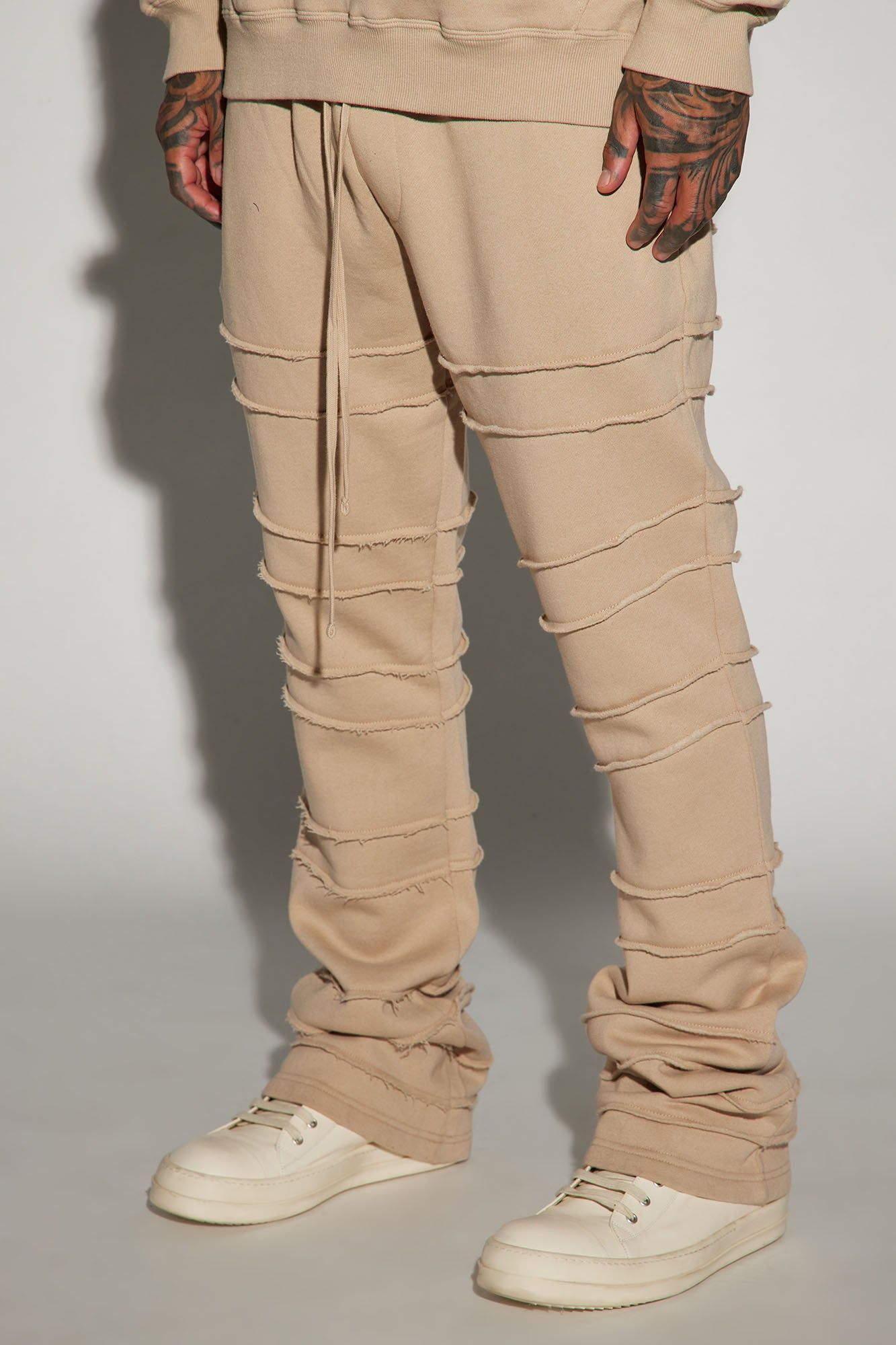 Tyson About Fray Flared Sweatpant - Tan sold by Fashion Nova