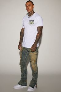 On The Set Stacked Skinny Snap Flare Jeans - Vintage Wash sold by Fashion Nova