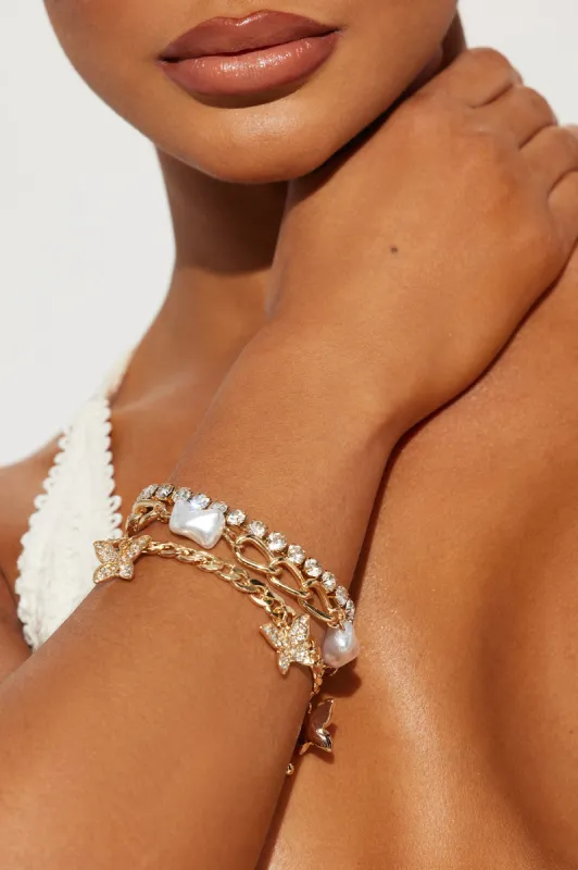 Fly Me Out Bracelet Set - Gold sold by Fashion Nova