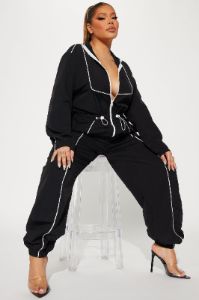 Sporty Love Windbreaker Jumpsuit - Black/White sold by Fashion Nova