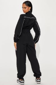 Sporty Love Windbreaker Jumpsuit - Black/White sold by Fashion Nova