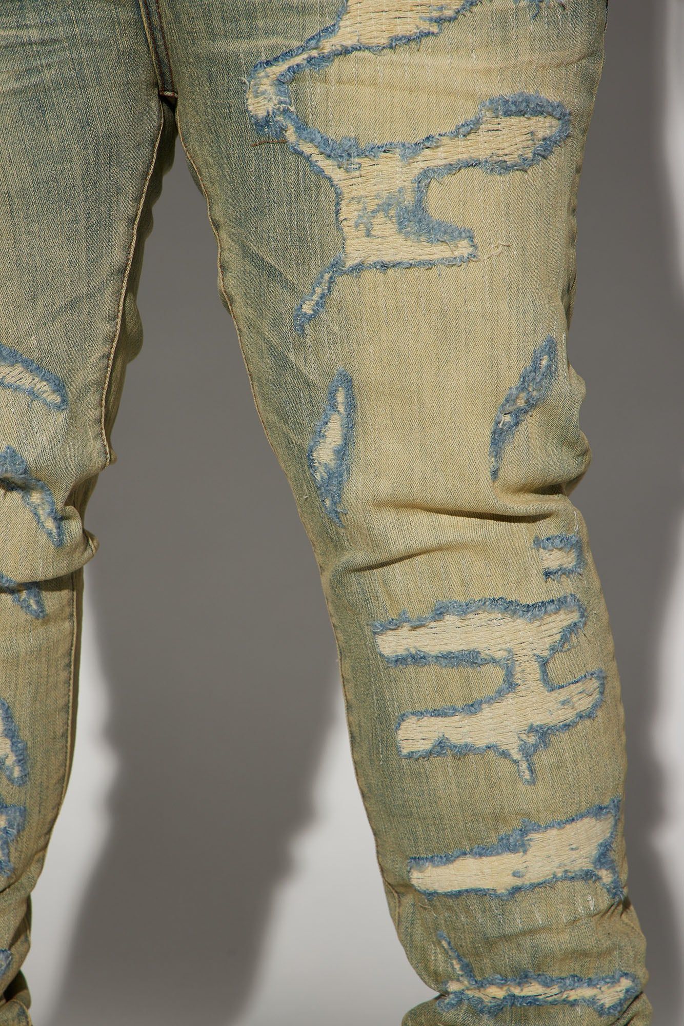 Leave It Ripped Stacked Skinny Jeans - Medium Blue Wash sold by Fashion Nova product image thumbnail 7