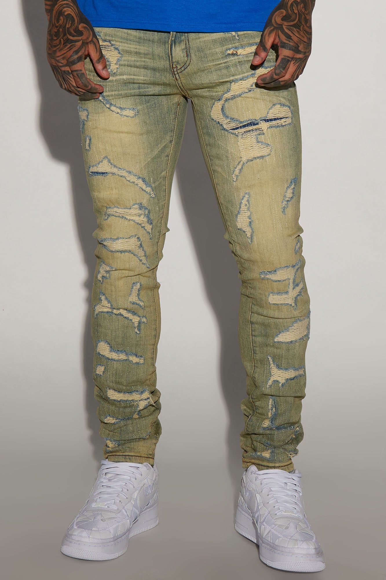 Leave It Ripped Stacked Skinny Jeans - Medium Blue Wash sold by Fashion Nova