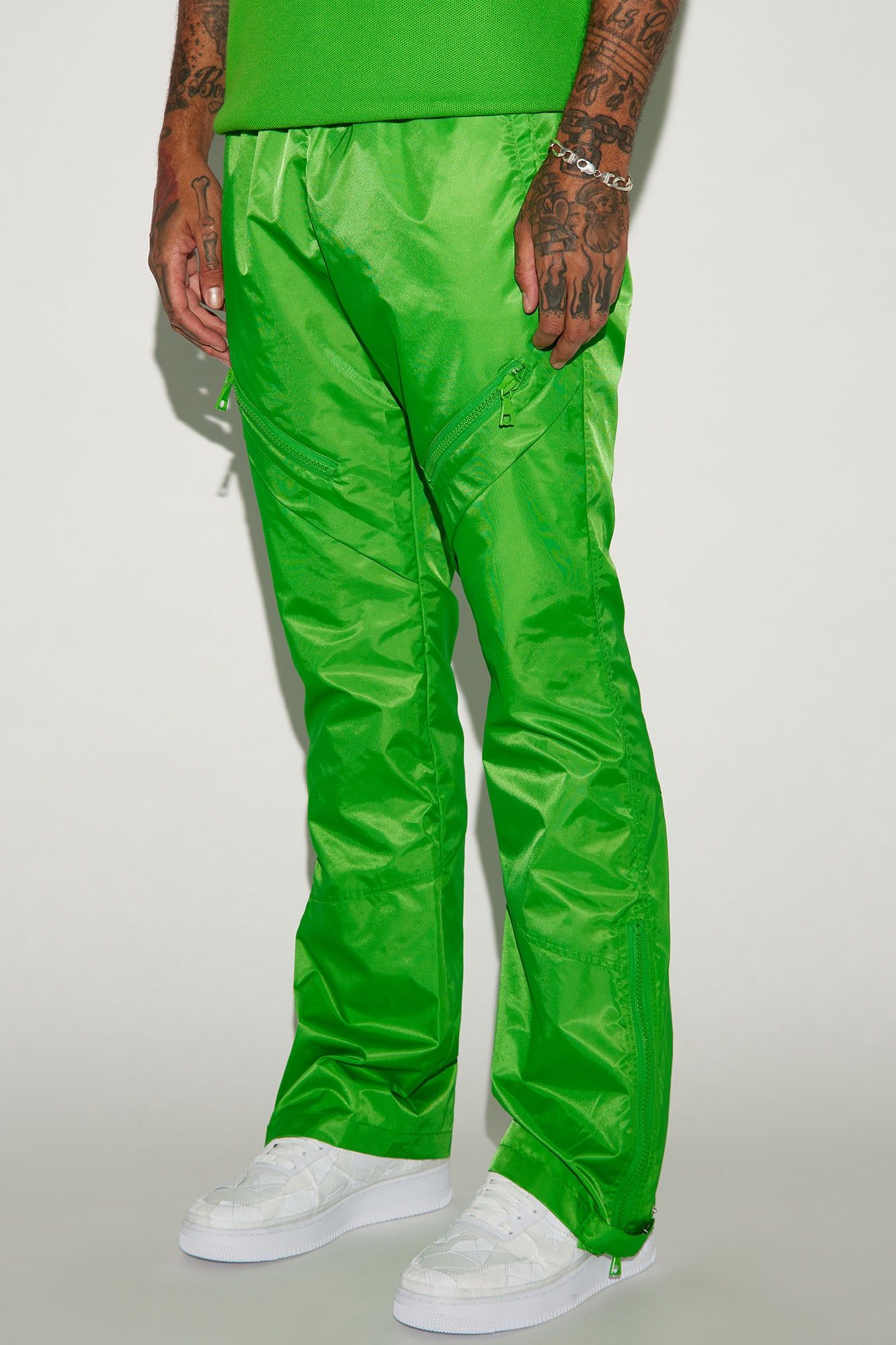 Play The Track Stacked Slim Flare Nylon Pants - Green | Parallel