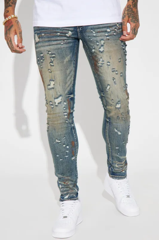 Dirty Ways Ripped Stacked Skinny Jeans - Dark Wash sold by Fashion Nova