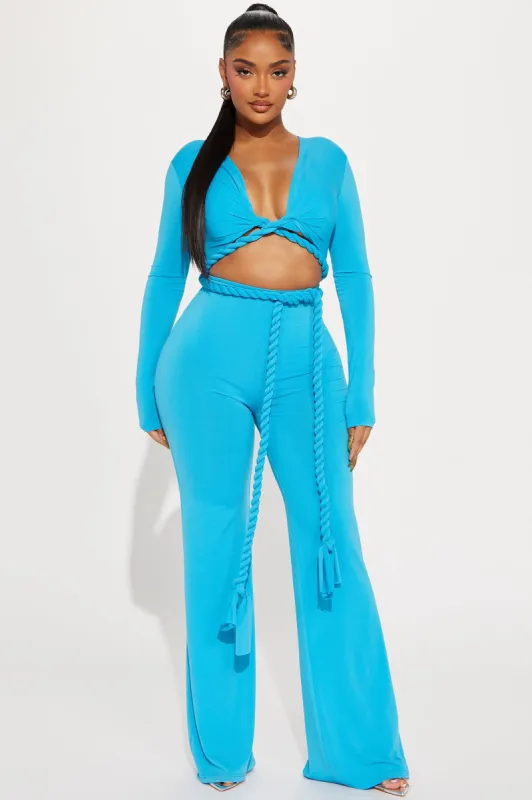 Reina Rope Jumpsuit - Turquoise sold by Fashion Nova