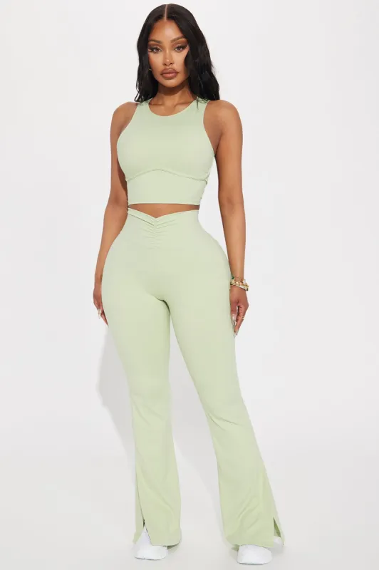 Pilates Girl Active Flare Pant - Sage sold by Fashion Nova