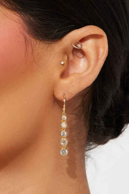 Another World Linear Earrings - Gold/Clear sold by Fashion Nova