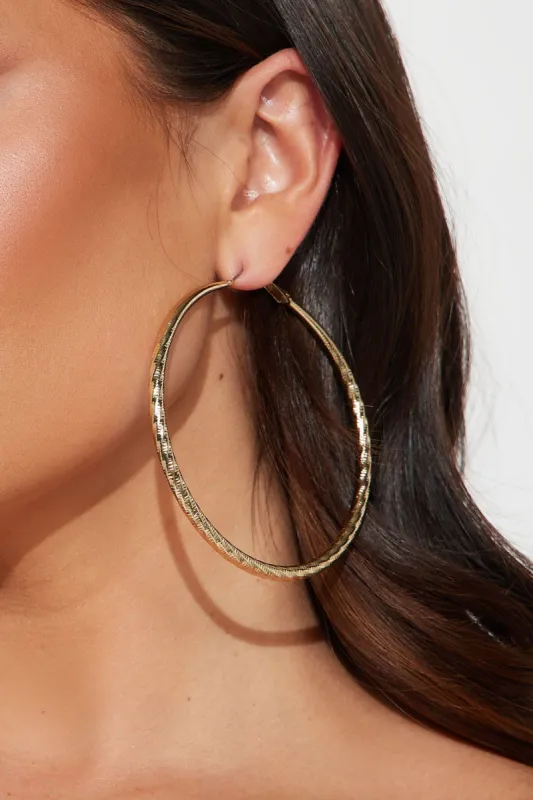 Brand New Girl Hoop Earrings - Gold sold by Fashion Nova