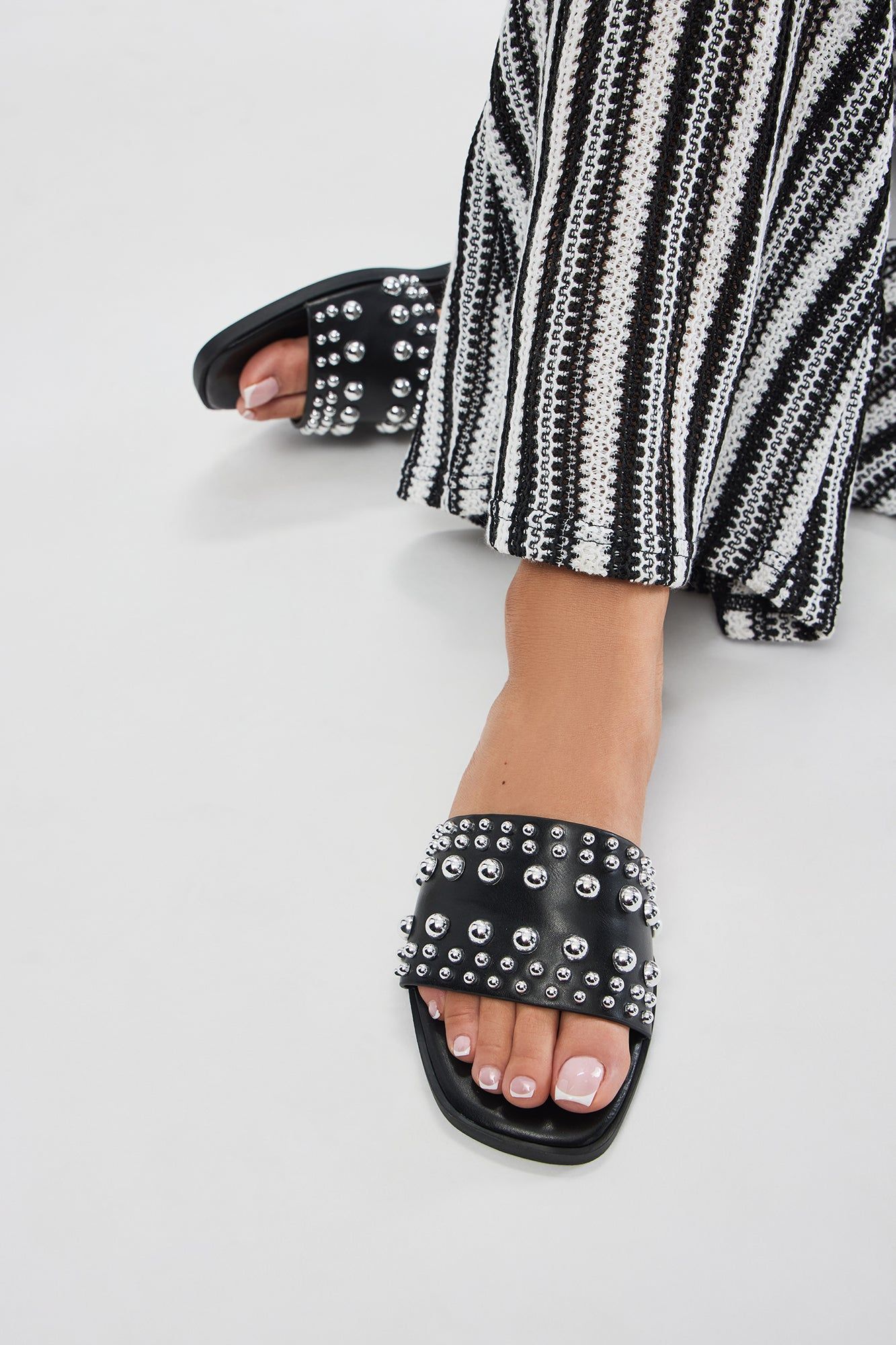 Really Going For It Studded Flat Sandals - Black sold by Fashion Nova
