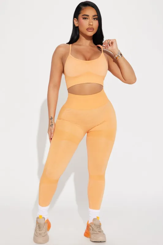 Anything's Possible Active Set - Orange sold by Fashion Nova
