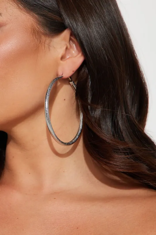 Brand New Hoop Earrings - Silver sold by Fashion Nova