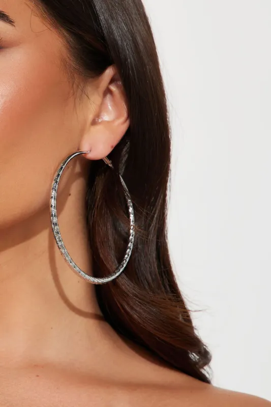 Brand New Girl Hoop Earrings - Silver sold by Fashion Nova