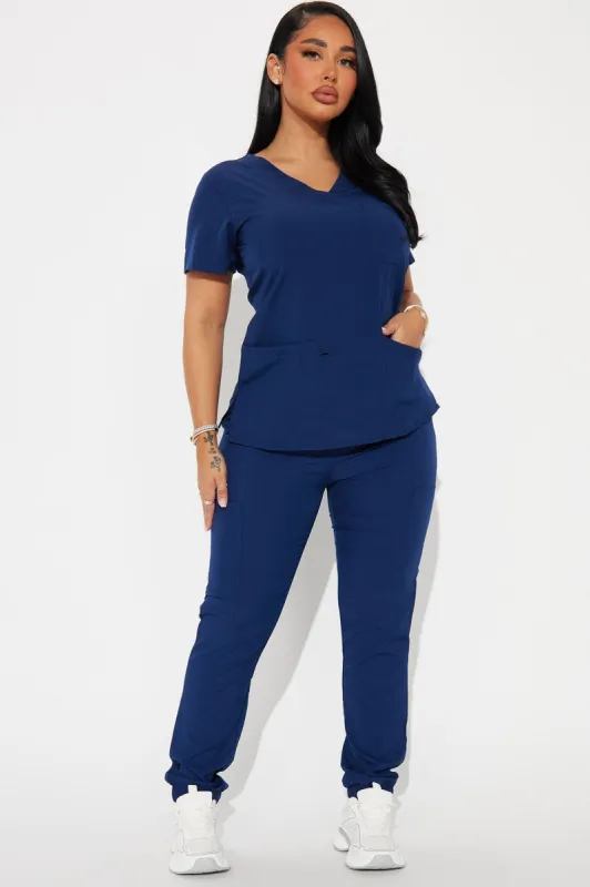 Working Overtime Jogger 4FLEX Uniform Scrub Set - Navy sold by Fashion Nova