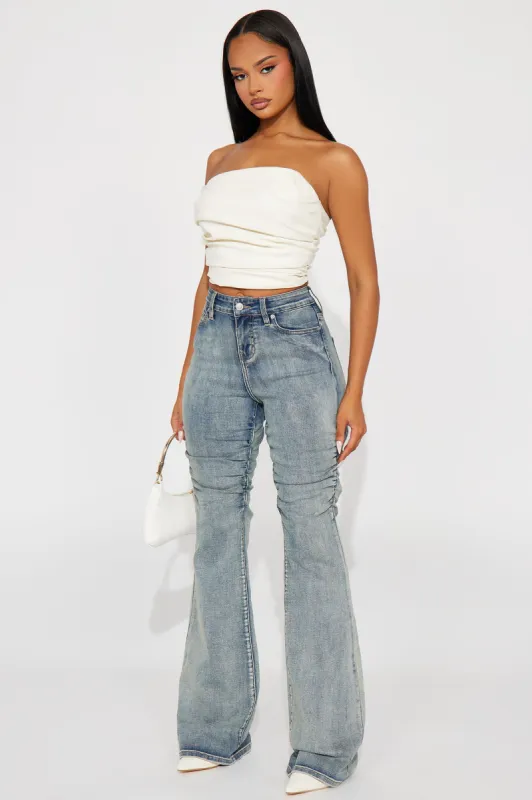In All The Right Places Stretch Tinted Flare Jeans - Vintage Wash sold by Fashion Nova