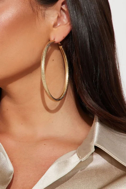 Brand New Hoop Earrings - Gold sold by Fashion Nova