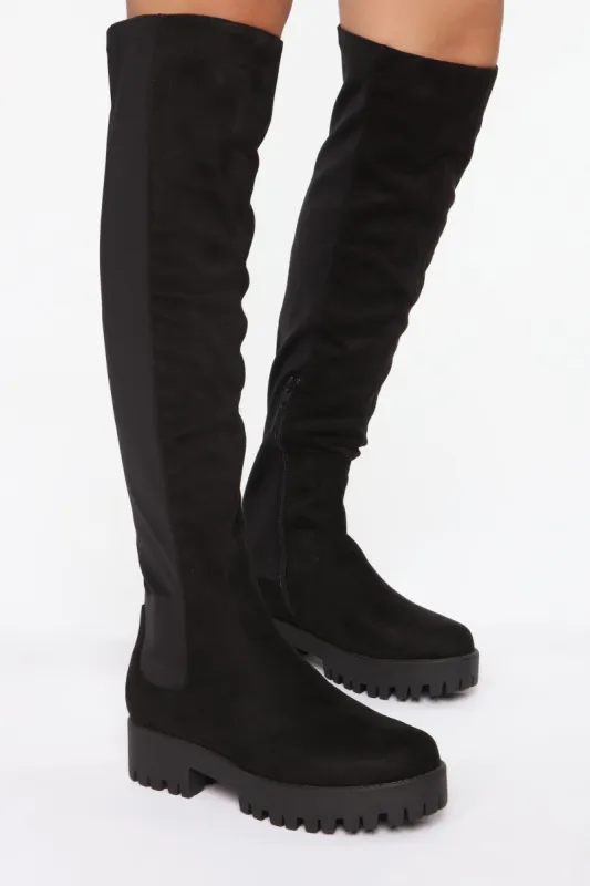 On The Move Flat Boots - Black sold by Fashion Nova
