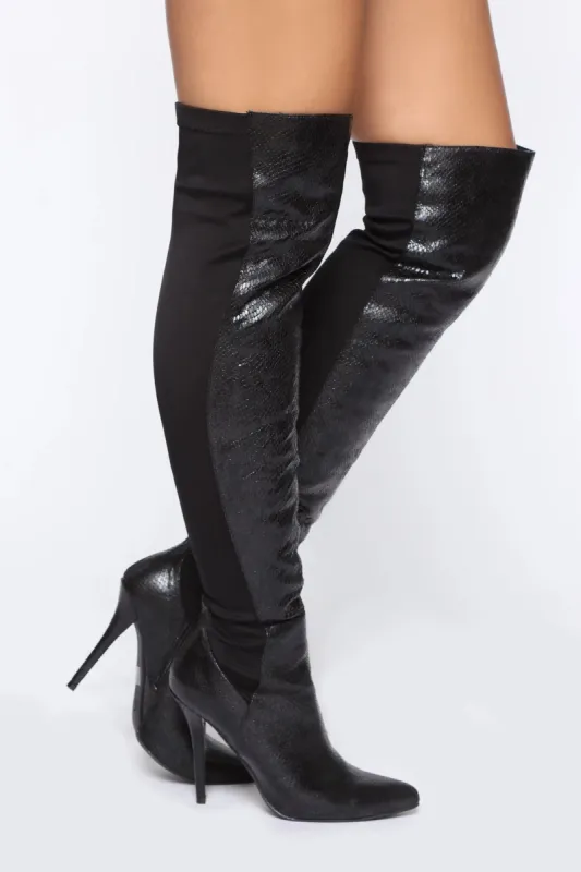 The Way You Walk Heeled Boots - Black Snake sold by Fashion Nova