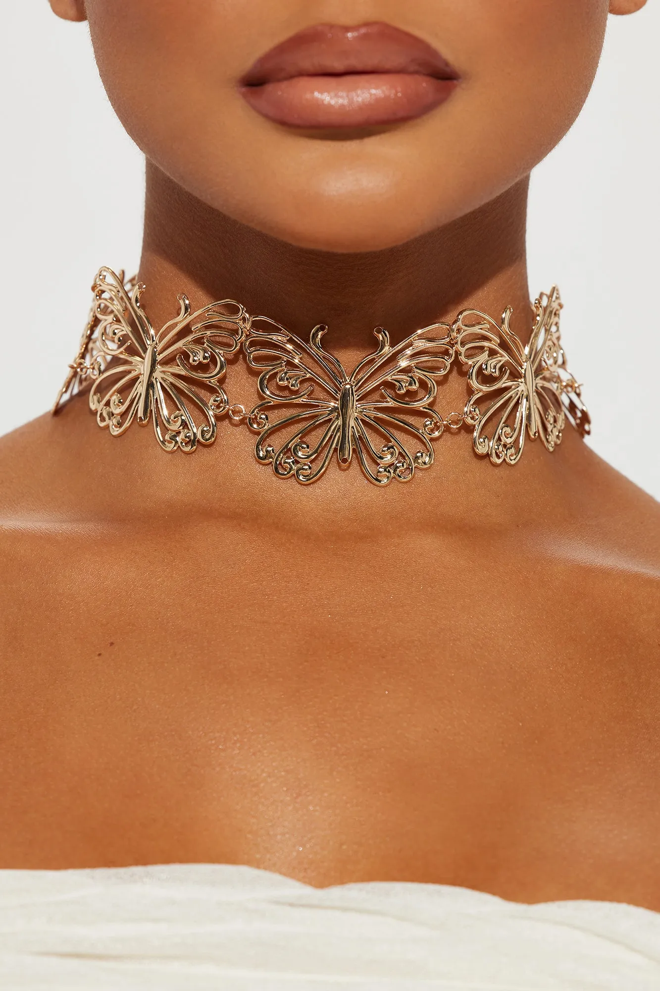 Sweetest Thing Butterfly Choker - Gold sold by Fashion Nova