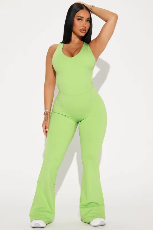 Alexus Active Jumpsuit - Sage sold by Fashion Nova