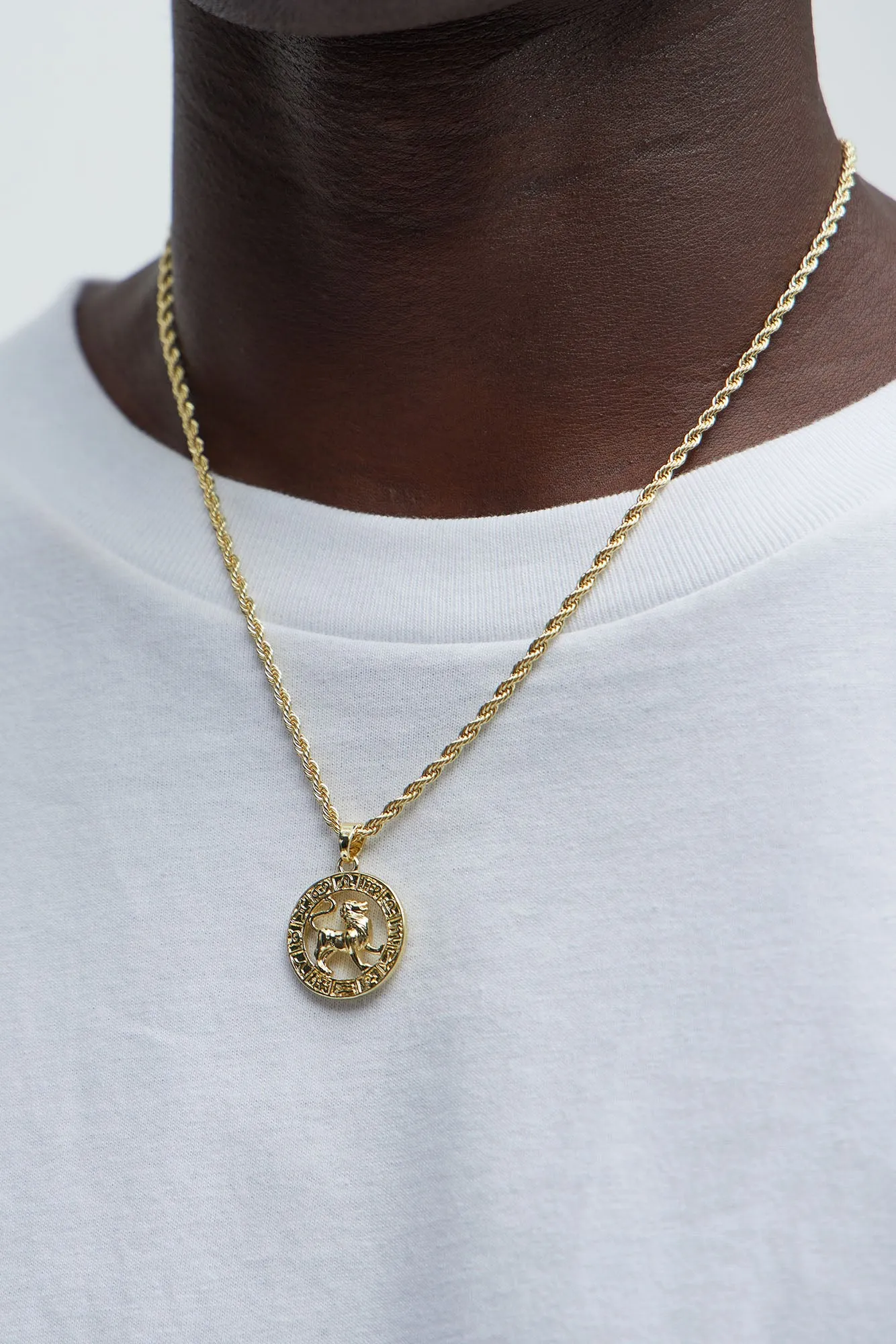 Leo Zodiac Pendant Necklace - Gold sold by Fashion Nova