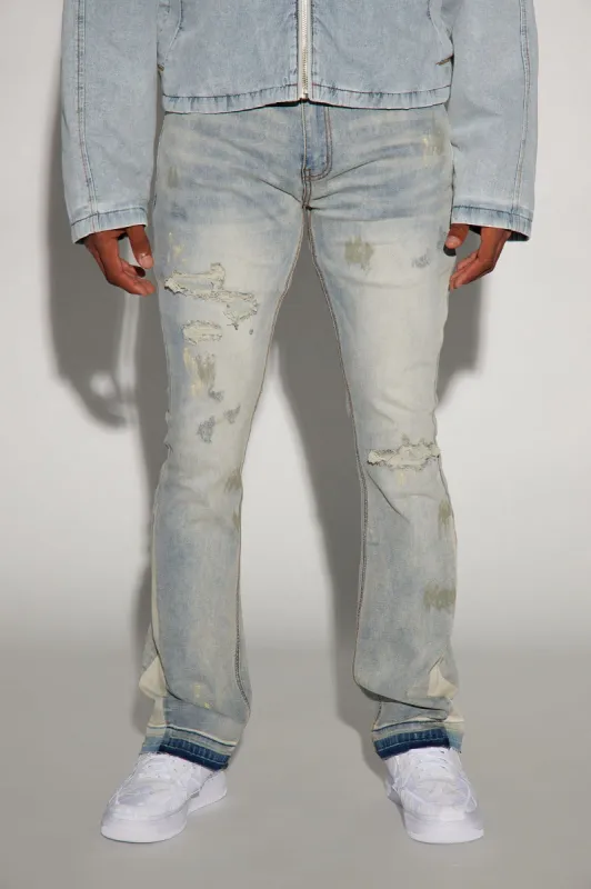 Leave Me Ripped Stacked Skinny Flared Jeans - Light Blue Wash made by Fashion Nova