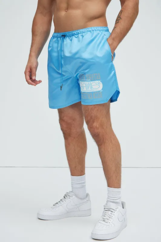Saint Team Swim Trunks - Blue sold by Fashion Nova