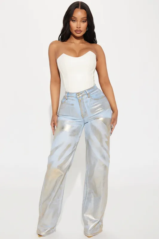 Gold Rush Metallic Stretch Baggy Jeans - Gold sold by Fashion Nova