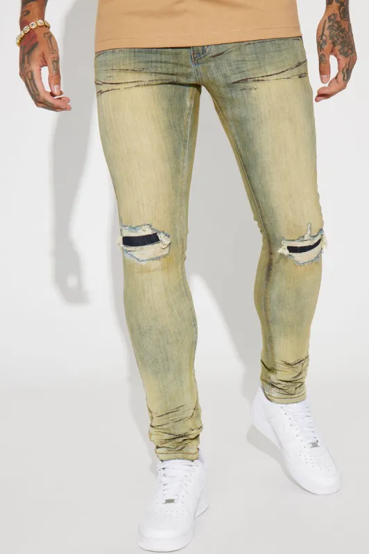 Check Me Out Ripped Stacked Skinny Jeans - Vintage Blue Wash sold by Fashion Nova