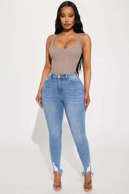 Making History Stretch Fray Hem Skinny Jeans - Light Wash sold by Fashion Nova
