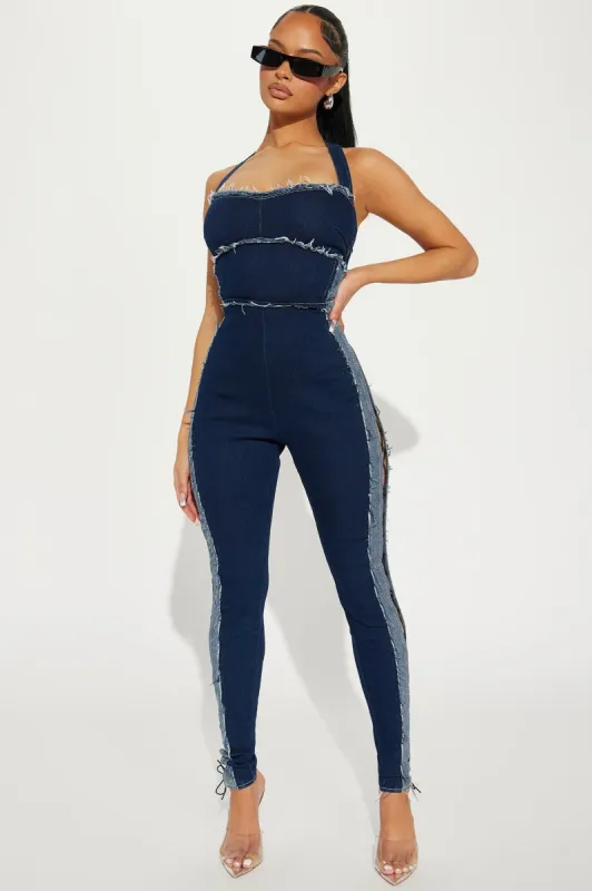 A Bit Flirty Denim Jumpsuit - Dark Wash sold by Fashion Nova